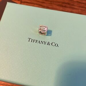 Tiffany & Co LOVE cube charm.